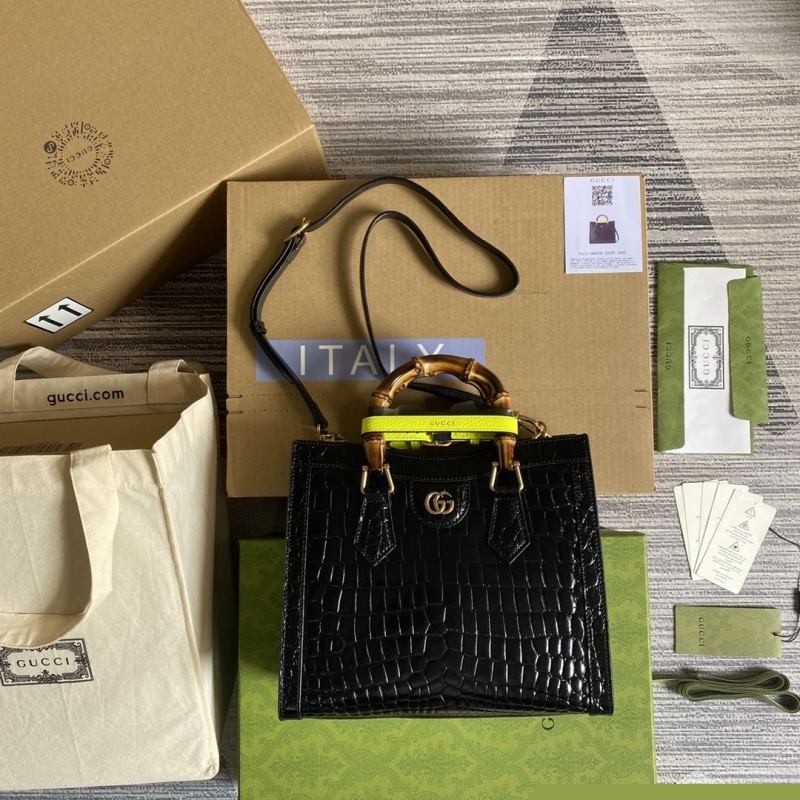 G*u*i top handle bags